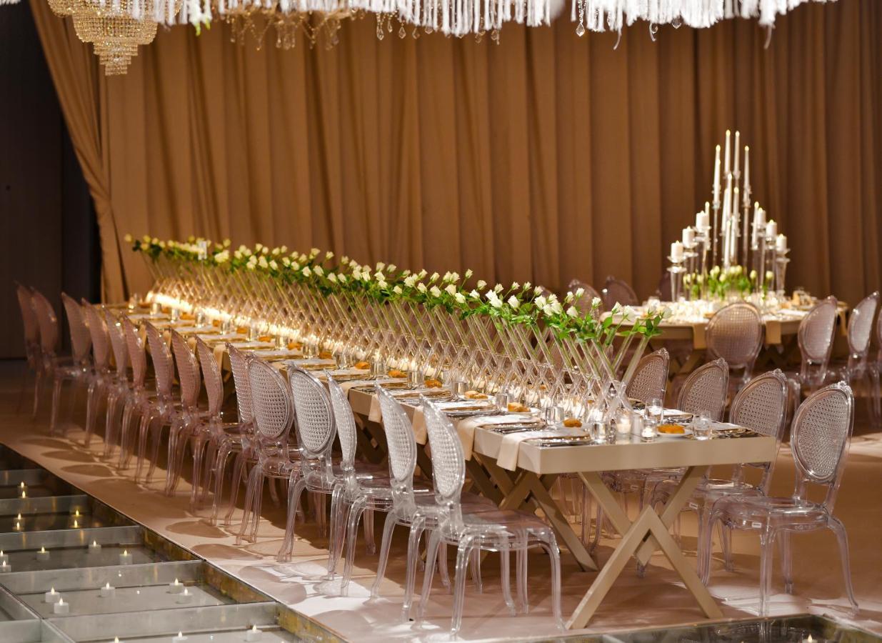 Address Istanbul Hotel Exterior photo A long table with chairs
