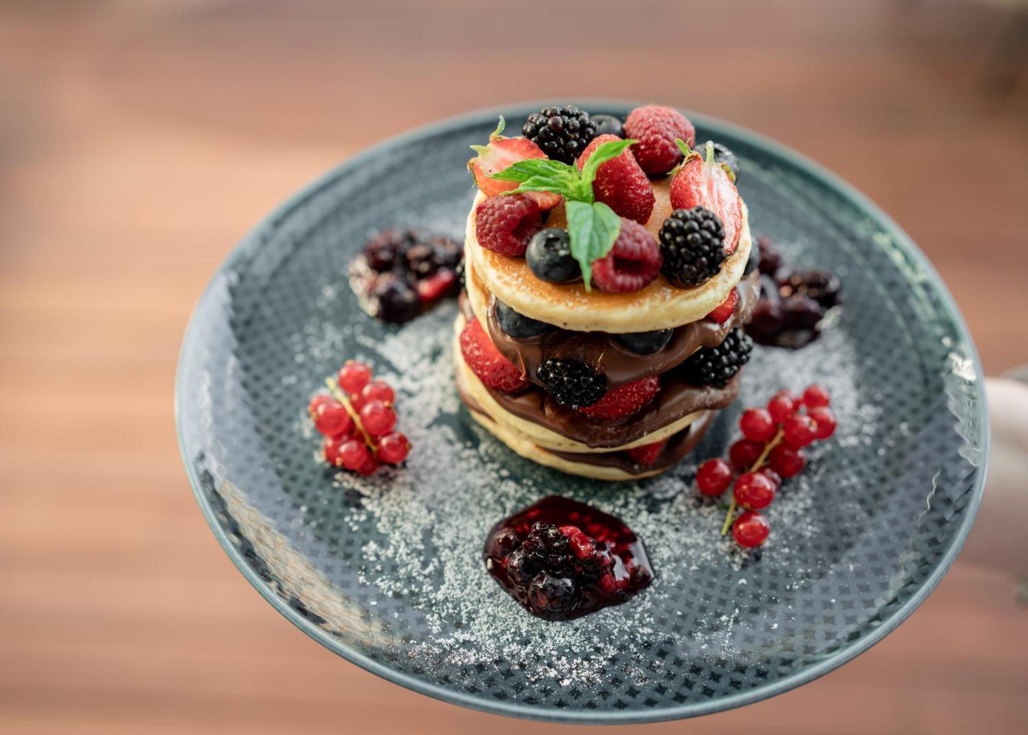 Address Istanbul Hotel Exterior photo A stack of pancakes with fruit